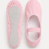 Roze kinderballetschoenen met elastiek en volledige suède zool, boven- en onderaanzicht